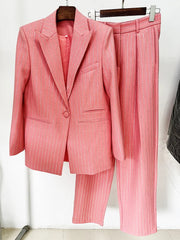 Pink pinstripe suit on a hanger against a white background