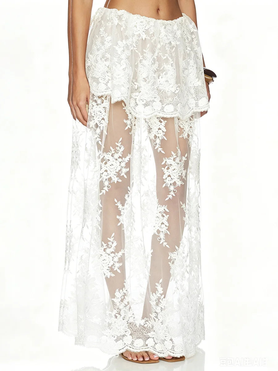 Close-up of white sheer floral lace maxi skirt with intricate pattern