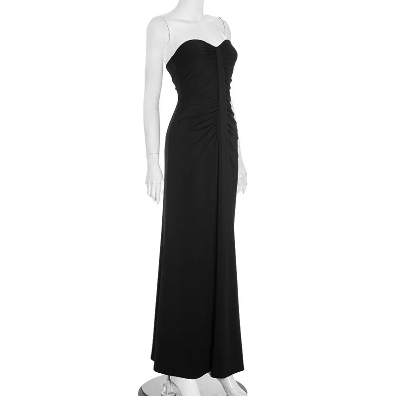 Black strapless gown on a mannequin against a white background