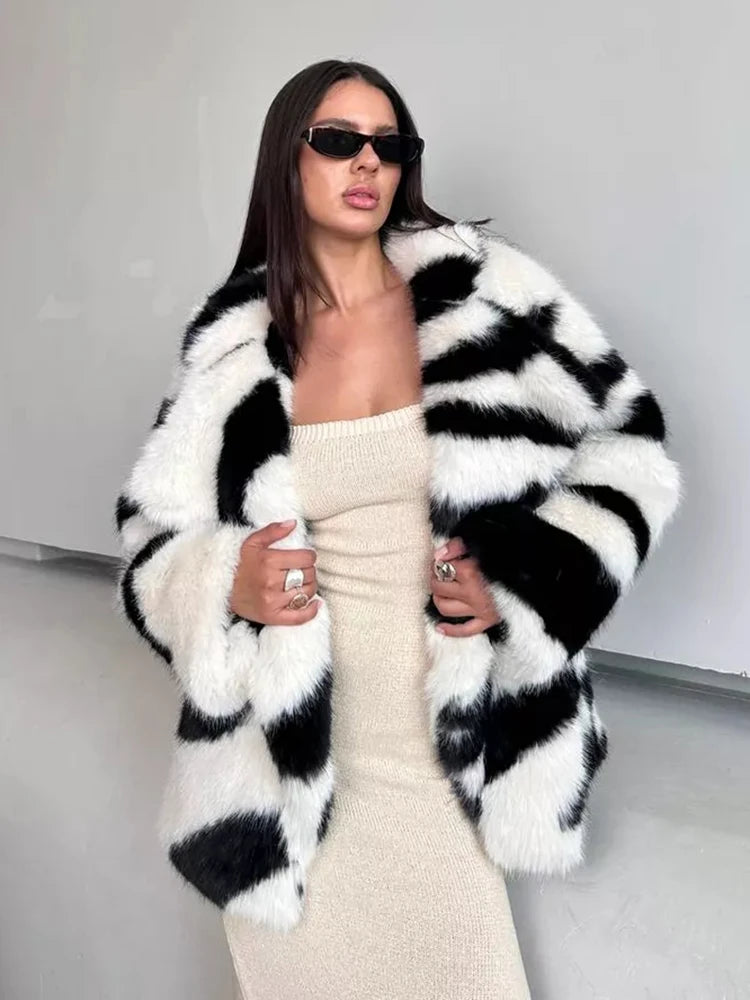 Women’s winter retro fur coat with zebra print and large lapel design.