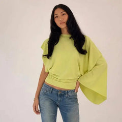 Close-up of the asymmetrical drop-shoulder knit top