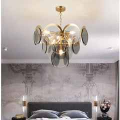 Lifestyle image showcasing the smoke gray chandelier adding a touch of sophistication to a modern bedroom.  Golden Atelier 2