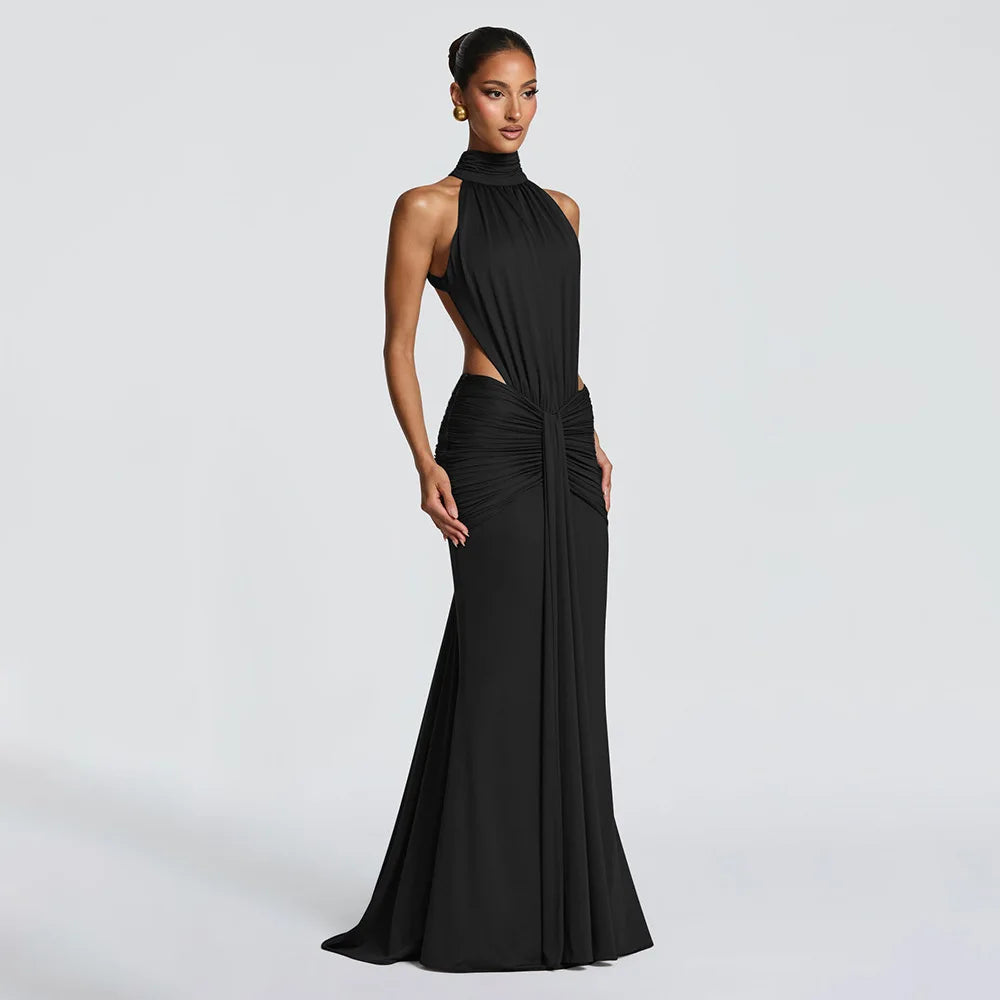 Black evening gown with cut-out design on a white background