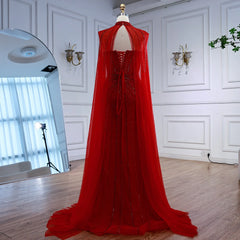 Red evening gown on a mannequin against a white wall.