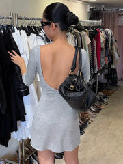 Solid V-Neck Ruched Sleeveless Mini Dress