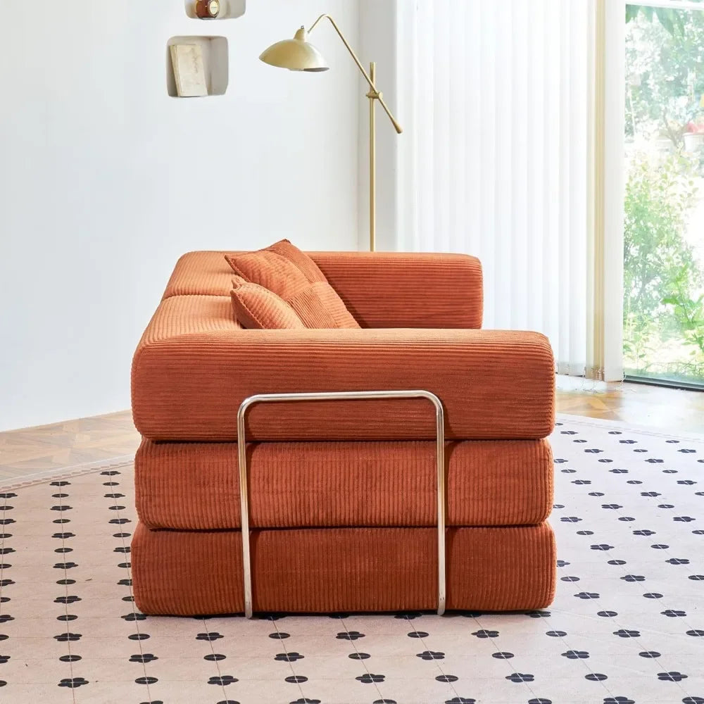 Orange sofa with metal legs in a modern living room
