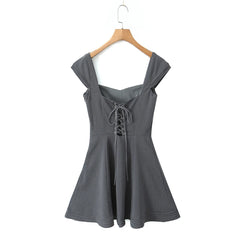  Women's dress with a criss-cross lace-up back.