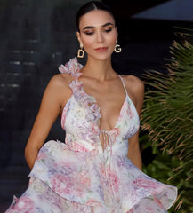 Woman wearing a floral dress with a blurred background