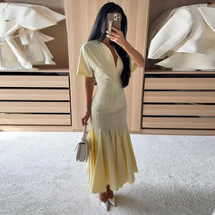 Yellow Solid Pleated Hem Maxi Dress
