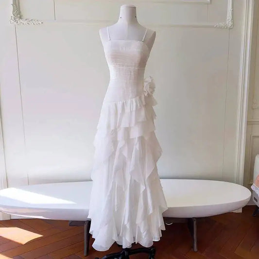 Strapless ruffle trim dress on a mannequin