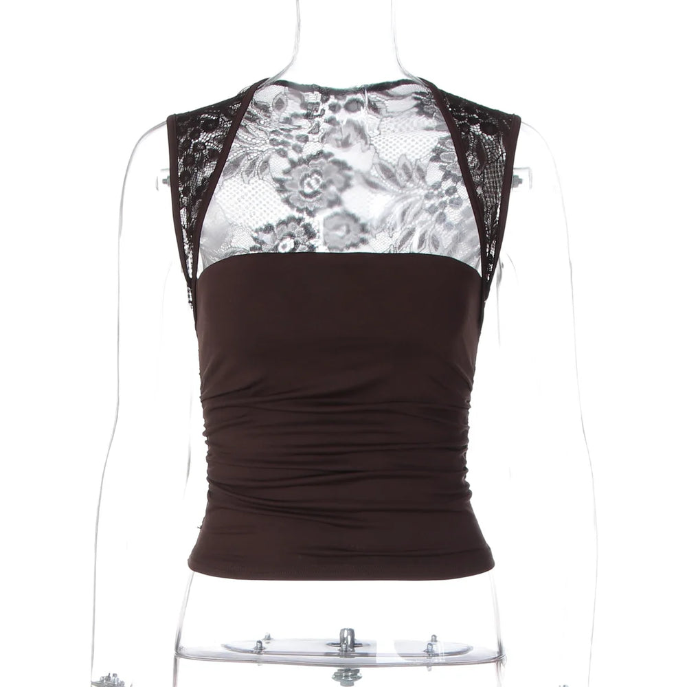 Brown top with floral lace overlay on a mannequin against a white background