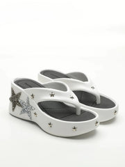 White platform wedge heels with star embellishments