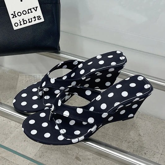 Black polka dot wedge flip-flops