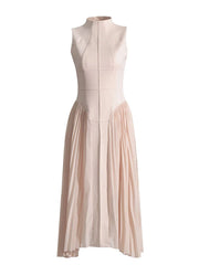 Beige sleeveless dress with a pleated skirt on a white background