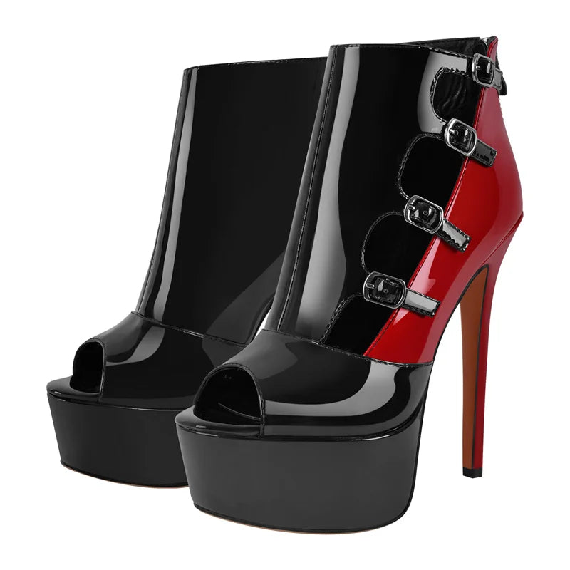 Pair of peep toe platform ankle boots with red and black patent leather and buckle details