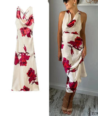 Women's midi dress with a floral print and zipper detail.