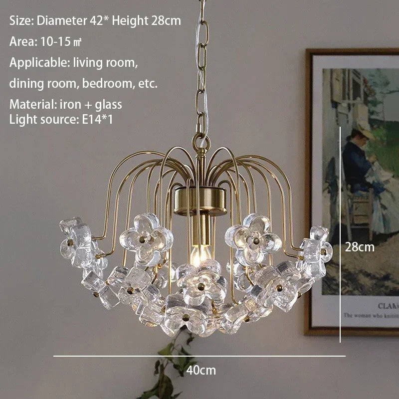 Retro pastoral French chandelier with clear glass petal shades and gold iron suspension in elegant living room