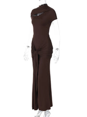 Brown evening gown on a mannequin against a white background