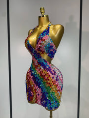 Side view of a halter neck mini dress with rainbow diamond embellishments