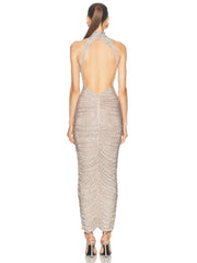  Women's backless maxi dress with a halter neckline and crystal details.