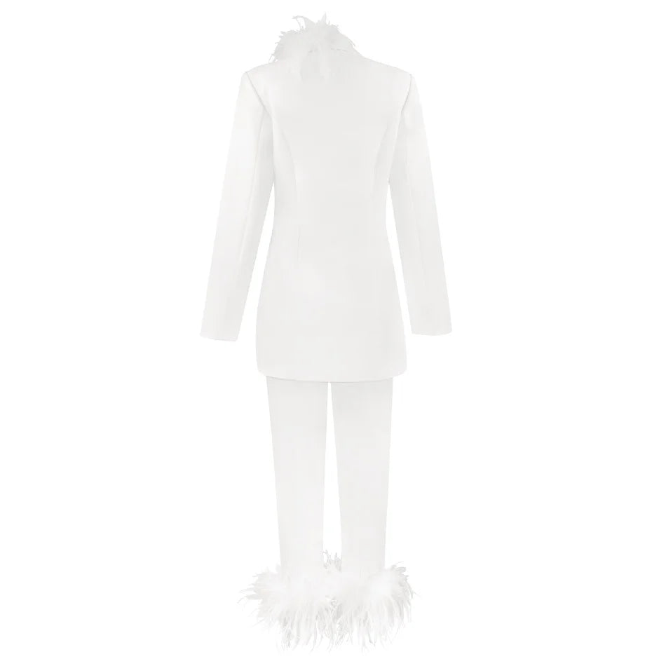 White outfit with long-sleeve top and pants on a white background