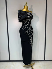 Black one shoulder dress with beading detail