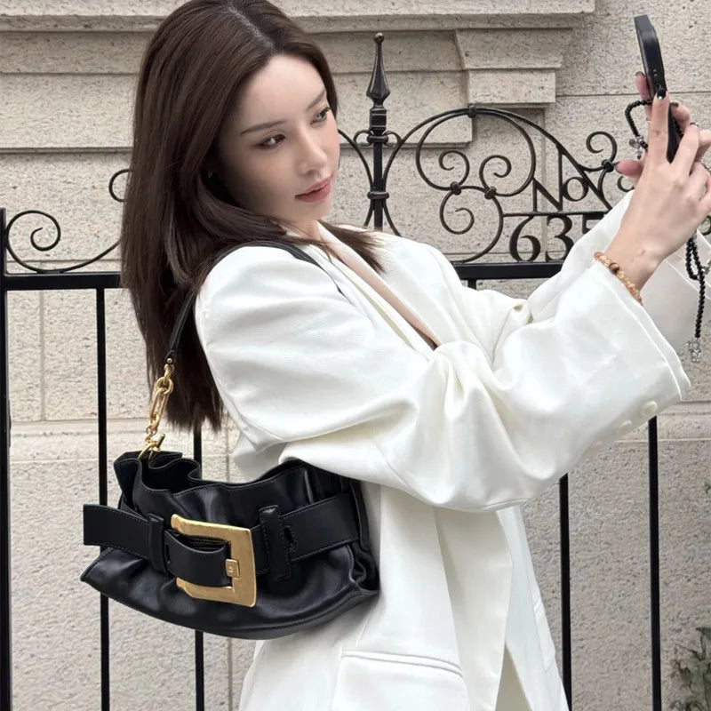 compact shoulder bag in black ivory and blush pink,
