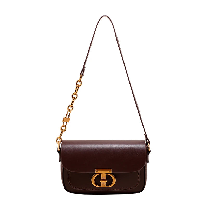 Brown handbag with gold chain strap and clasp on a white background