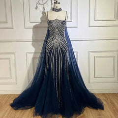 Sleeveless mermaid gown with crystal beading and backless neckline — perfect formal dress for gala, wedding, or evening event