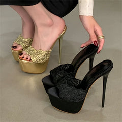 Gold platform high heels and black high heels with lace details on a neutral background