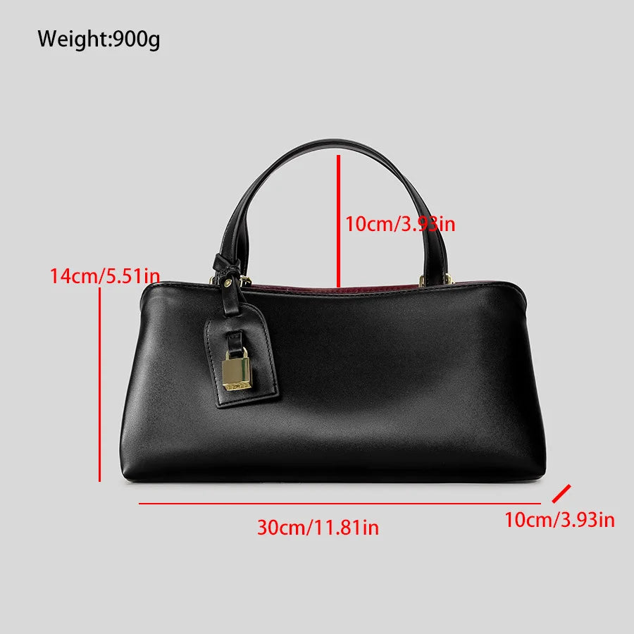 Dimensions and weight of a black structured top handle bag.
