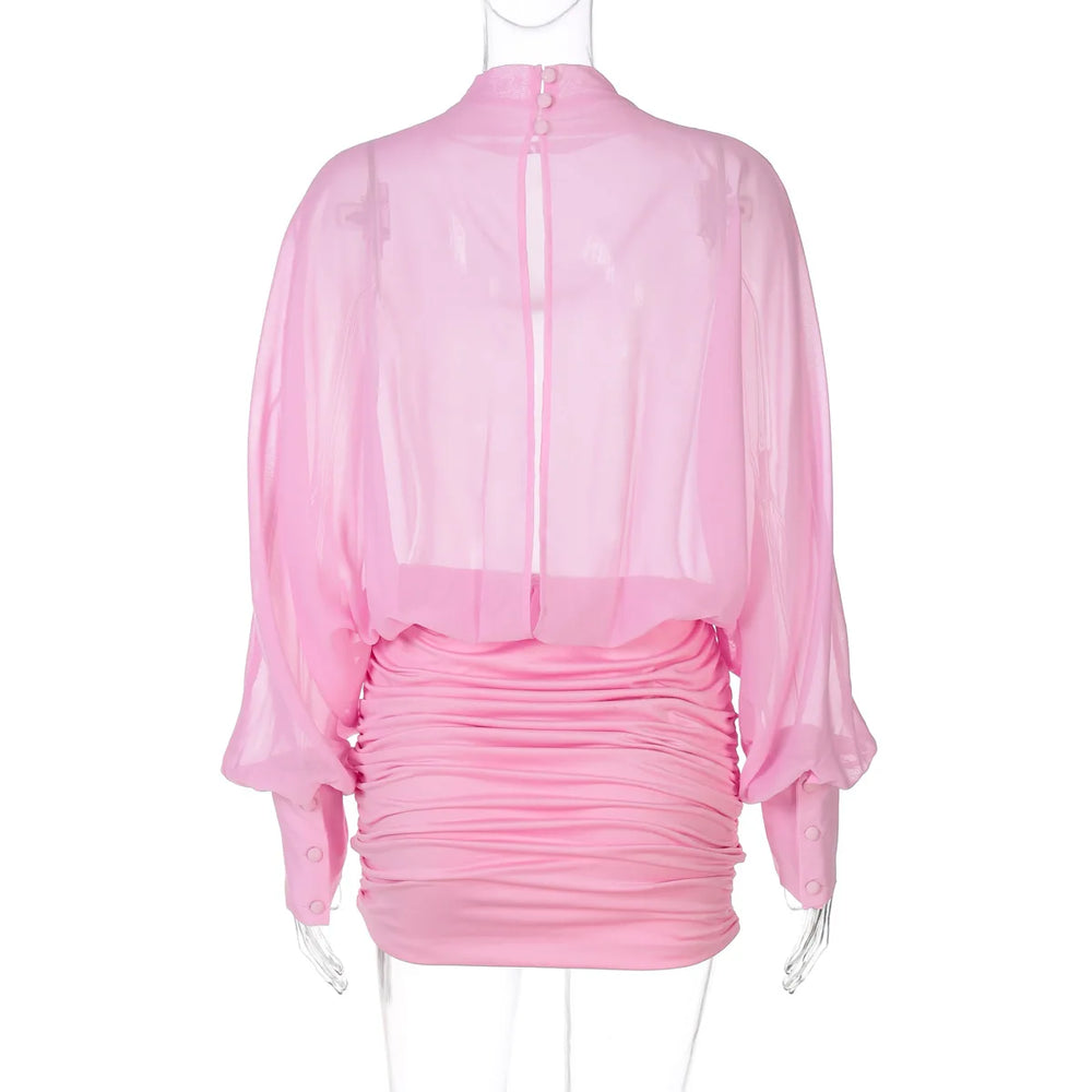 Pink ruched dress on a mannequin against a white background