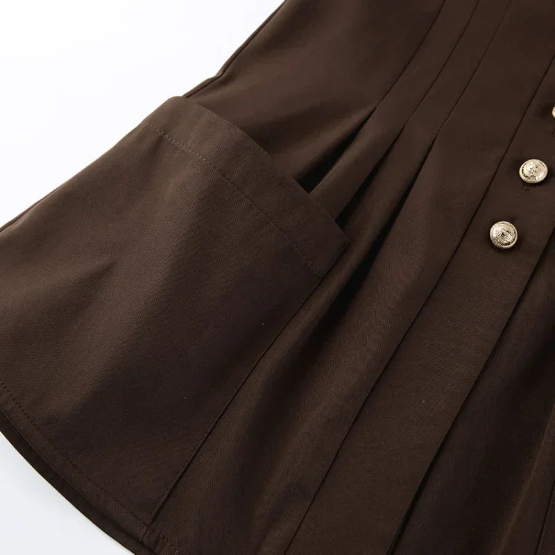 Close-up of a brown jacket with buttons on a white background
