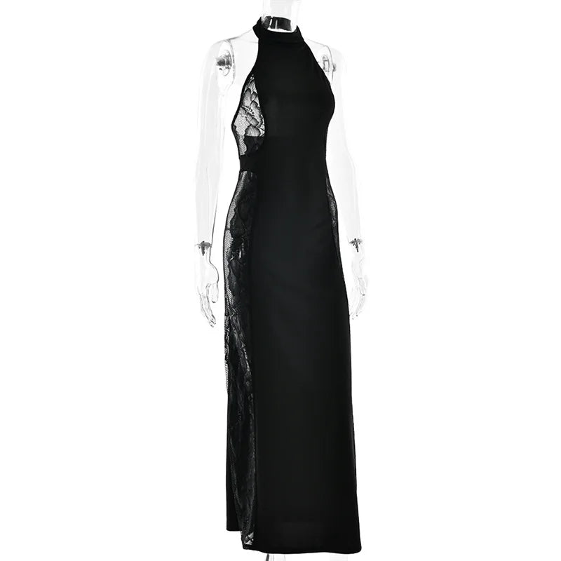 Black evening gown with sheer panels on a white background