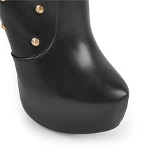 Close-up of platform toe on studded stiletto boot