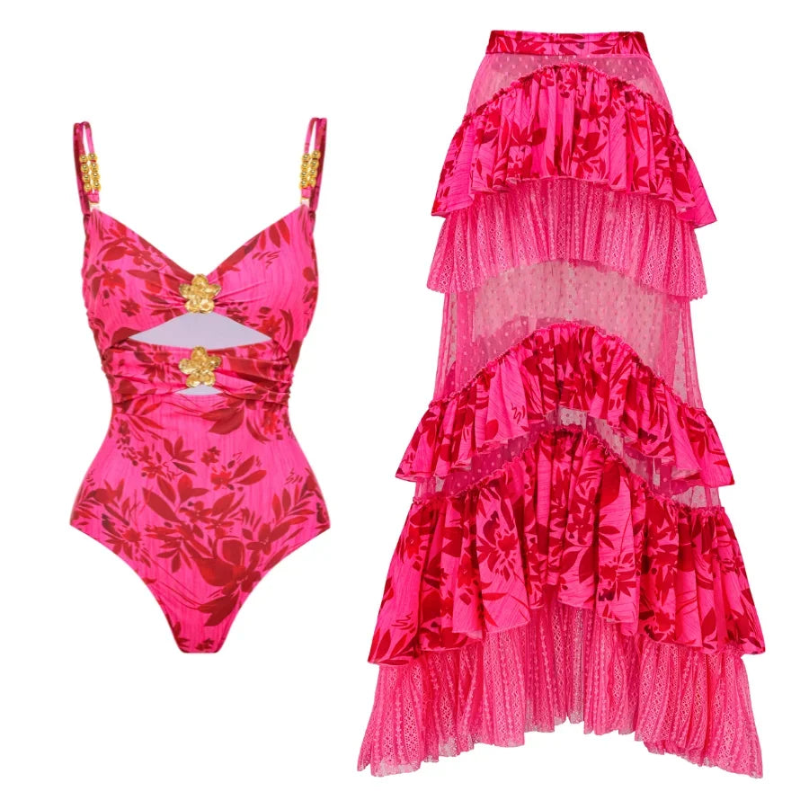 Flat lay of pink floral print one piece swimsuit and ruffled skirt