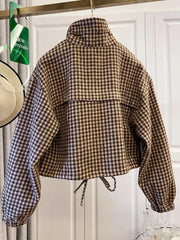 Houndstooth print cropped bomber jacket with stand-up collar and drawstring hem, back view.