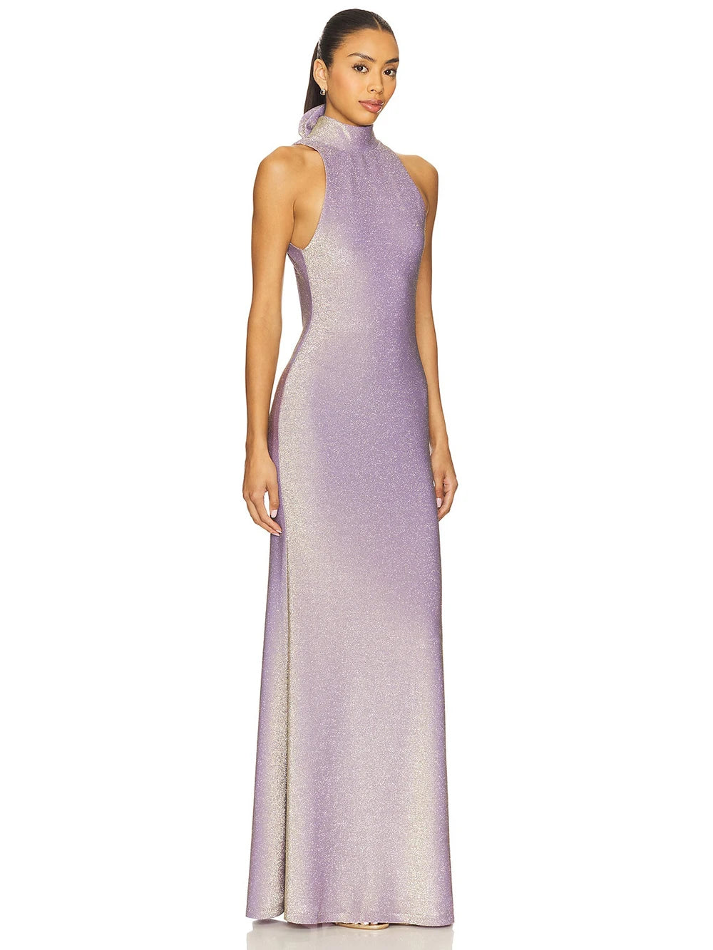 Woman wearing a long, light purple dress on a white background