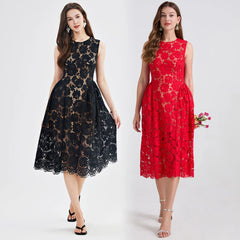 Two women wearing black and red lace dresses on a white background
