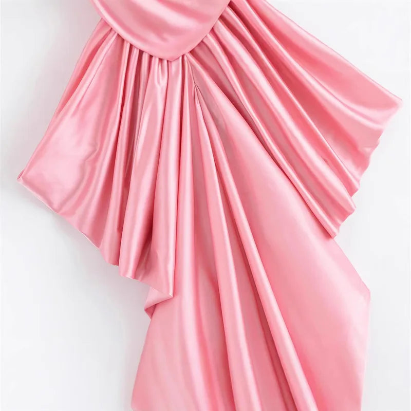 Pink fabric with a draped design 