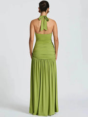 Green halter neck gown on a white background