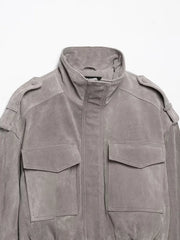 Close-up of high neck suede cropped jacket
