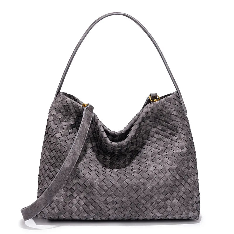 Gray woven handbag on a white background