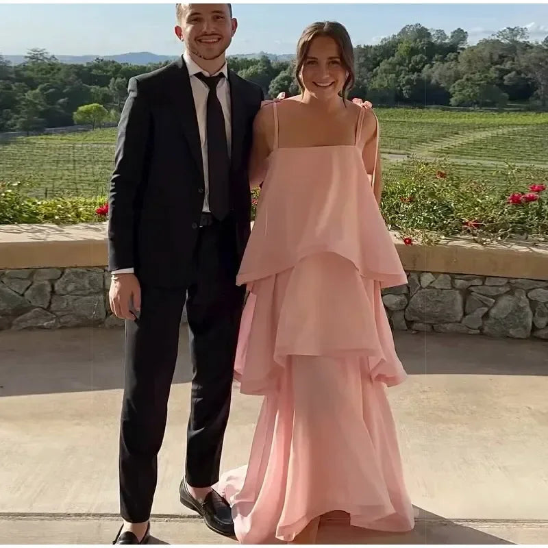 Strapless ruffle maxi dress with a vineyard background