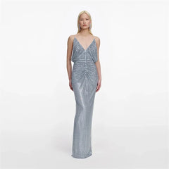 Full length view of crystal embellished V-neck maxi dress