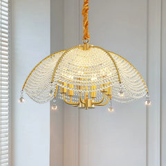 A sparkling crystal chandelier illuminating a modern living room, creating a luxurious ambiance.