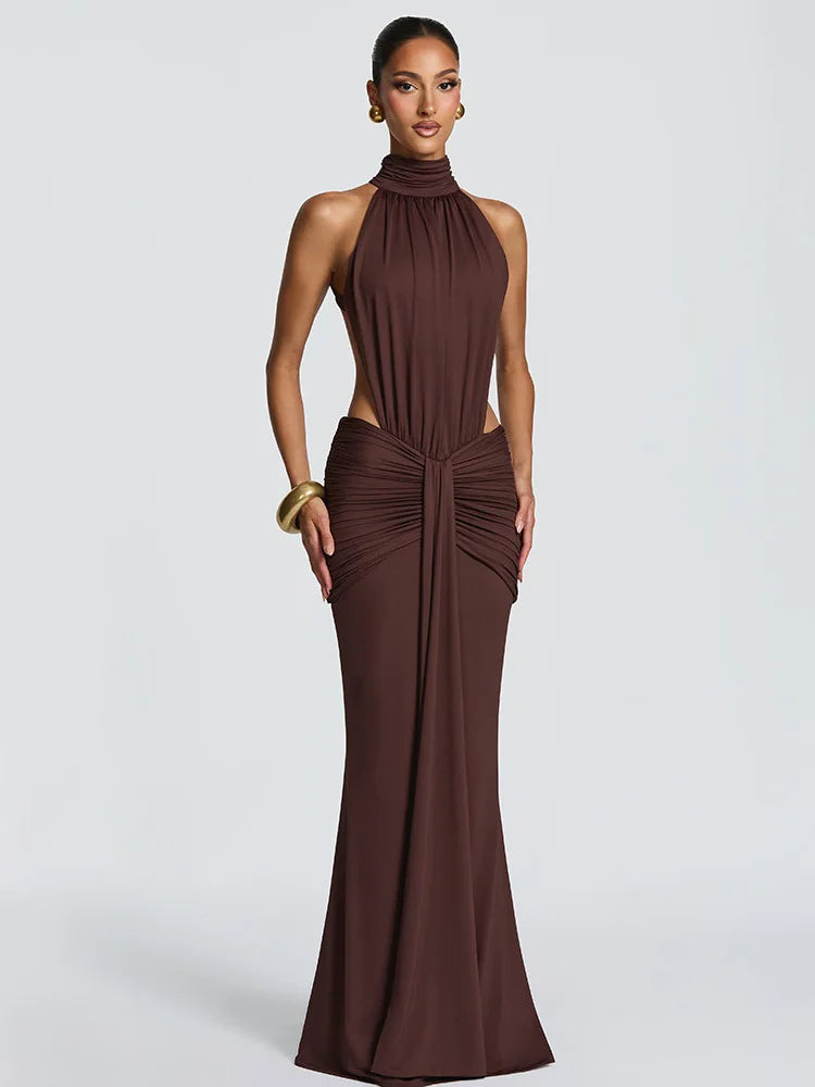 Woman wearing a brown evening gown on a white background