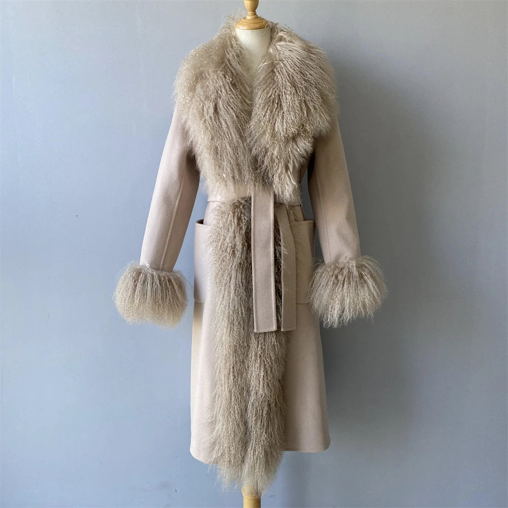 Beige coat with fur trim on a mannequin against a plain background
