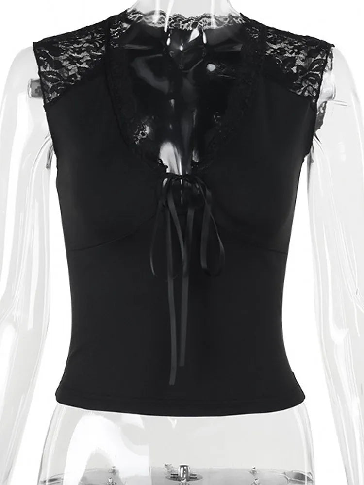 Black sleeveless top with lace details on a mannequin against a white background