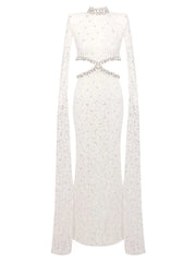 White long-sleeve dress with embellishments on a white background